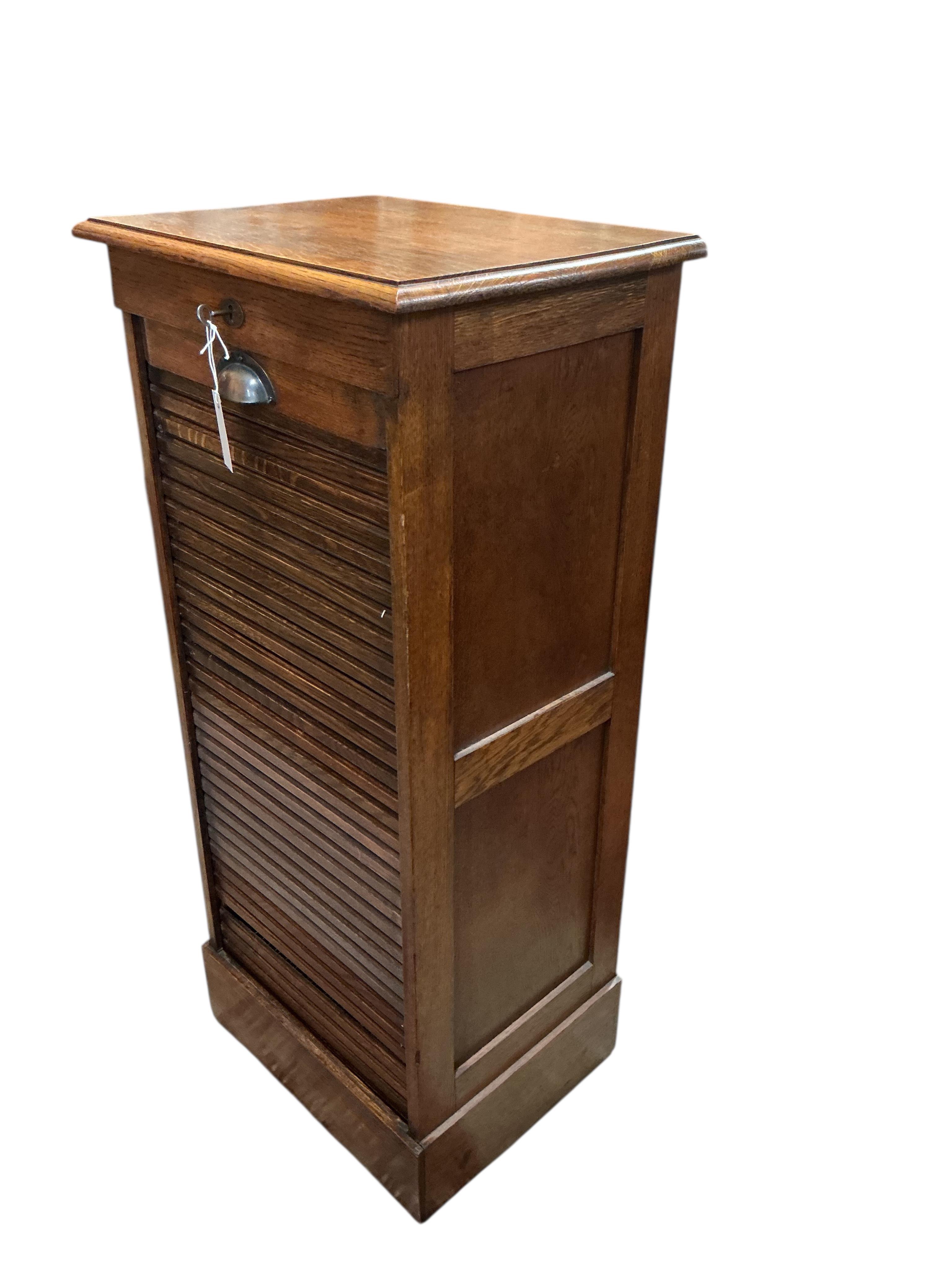An early 20th century oak tambour filing cabinet, width 50cm, depth 39cm, height 111cm